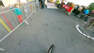 Bicyclist Participates in Urban Downhill Race