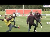 Wayne Rooney slide tackles John Stones in intense practice drill