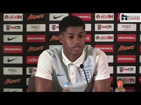 Marcus Rashford says Wayne Rooney's England career isn't over.