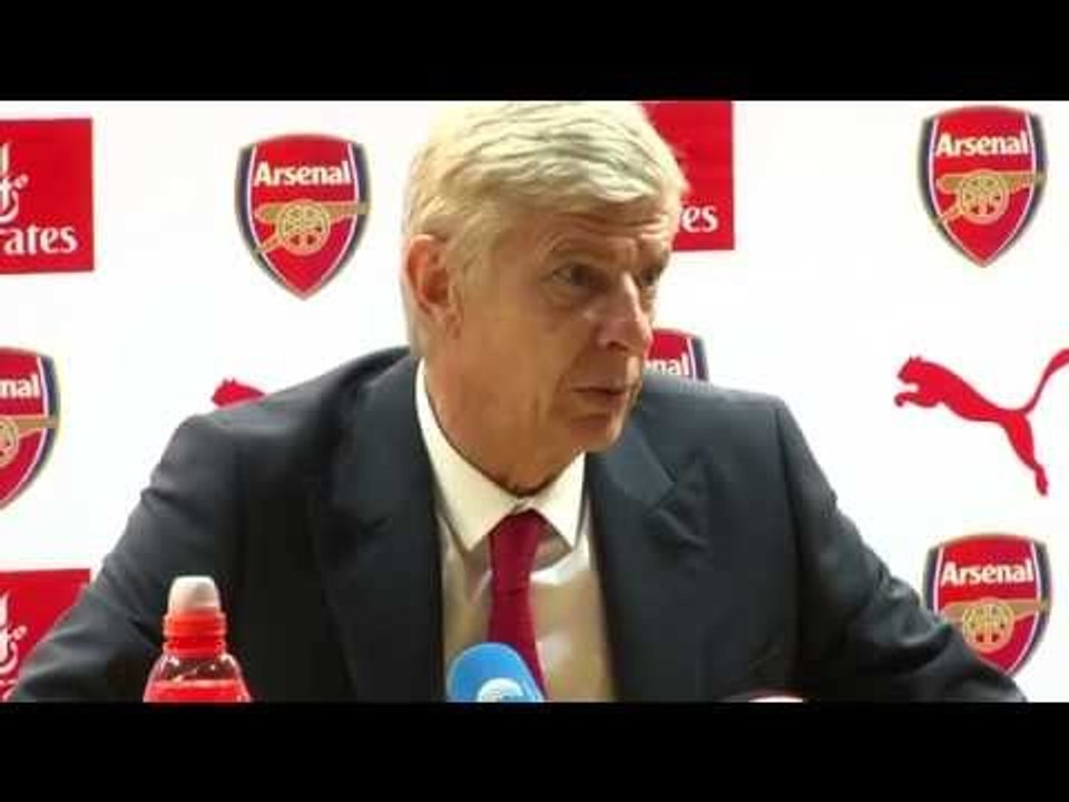 Wenger: 'We are in the title race to win it'