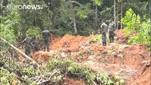 Rescuers struggle to reach Sri Lankan flood and mudslide victims
