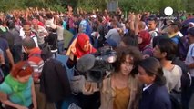 Refugees massed on Serbian border face long walk into Europe