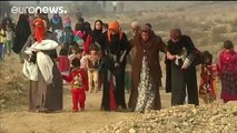 Thousands flee as battle for Mosul rages - world