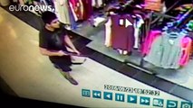 Suspect held over deadly US shopping mall shooting