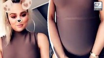 Khloe Kardashian Proudly Flaunts Her 8-Month Baby Bump