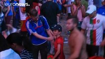 Euro 2016: Young Portugal supporter consoles teary-eyed French fan