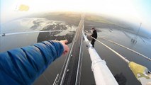 Don't Look Down! Daredevils Get Dragged for Reckless Behavior After Climbing Huge Bridge