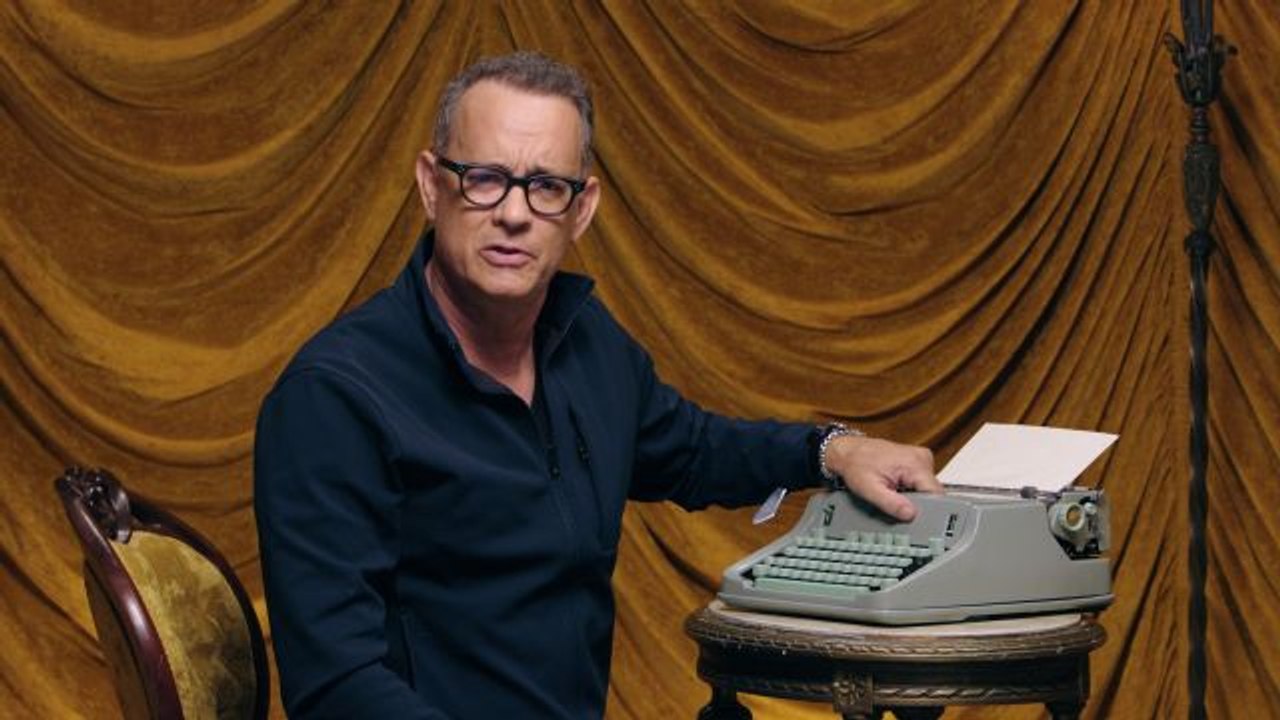 Tom Hanks Changes the Ribbon on a Typewriter