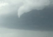Small Funnel Cloud Forms Over Highway in Jasper, Alabama