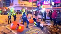 Violent clashes in Hong Kong as police crackdown on street vendors
