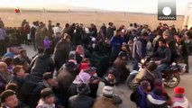 Civilians flee Aleppo as Syrian army and Russian air power lay siege