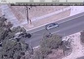 Motorcyclist Speeds Towards Oncoming Traffic in Police Pursuit