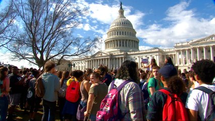 US students walk out in protest for tougher gun laws