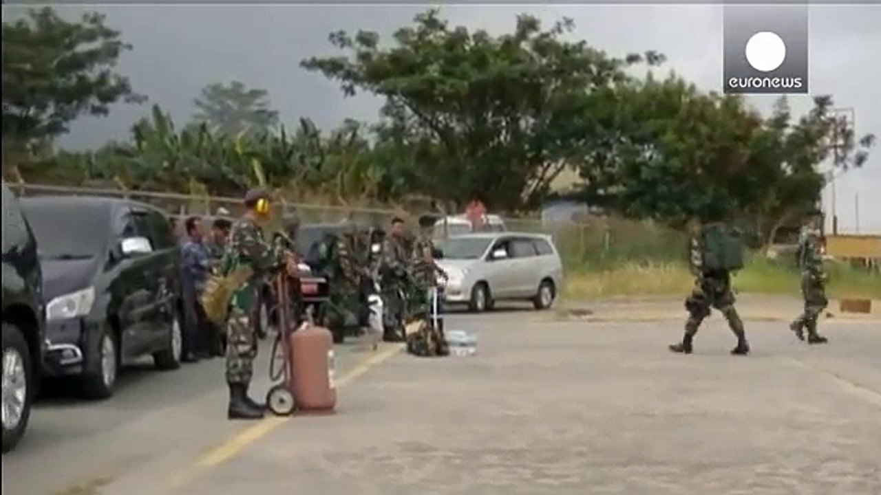 Indonesian rescue teams find 54 bodies at plane crash site