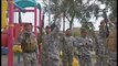 Iraqi soldiers and Shi'ite militia celebrate victory in Tikrit