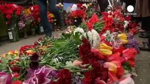 Peope in the Ukrainian port of Odessa remember victims who died during clashes a year ago