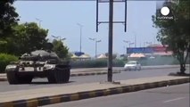 Yemen president flees palace as fighting erupts in Aden