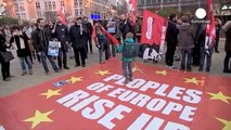 Demonstrators in Athens and Brussels tell EU finance ministers  - no more austerity!