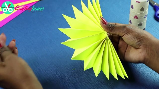 DIY Paper Rosettes Garland for Simple Party Decorations on Budget