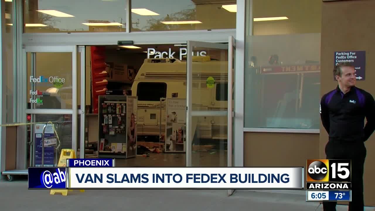 Van slams into FedEx building in Phoenix
