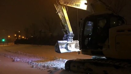 JCB that tore down Fortunestown Lidl driven off crime scene by Gardai. Storm Emma Lidl Robbery