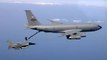 Civilian Air Refueling Tanker Omega 707 Refuels With Military F-18 Aircraft