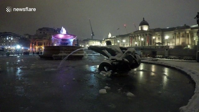 London's Trafalgar Square fountains continue to freeze over
