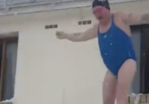 Man in Swim Kit Jumps From Second-Story Window into Snow