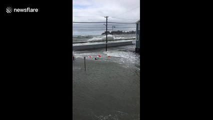 High tides from powerful nor’easter flood streets in Massachusetts