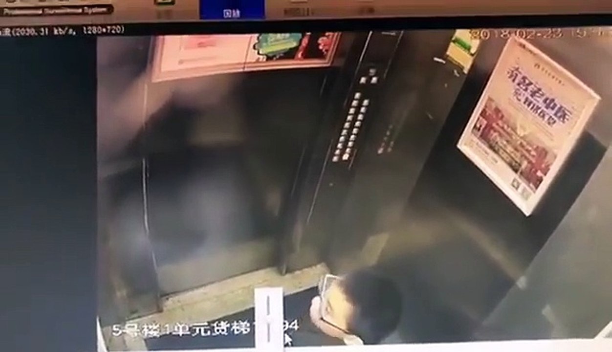 Chinese boy pee on elevator end up stuck inside