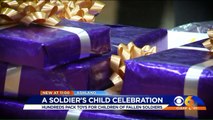 Hundreds of Volunteers Pack Toys for Children of Fallen Soldiers