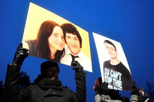 Hundreds bid farewell to slain Slovak journalist as authorities release suspects
