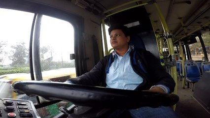 International Women's Day: Portrait of a female bus driver