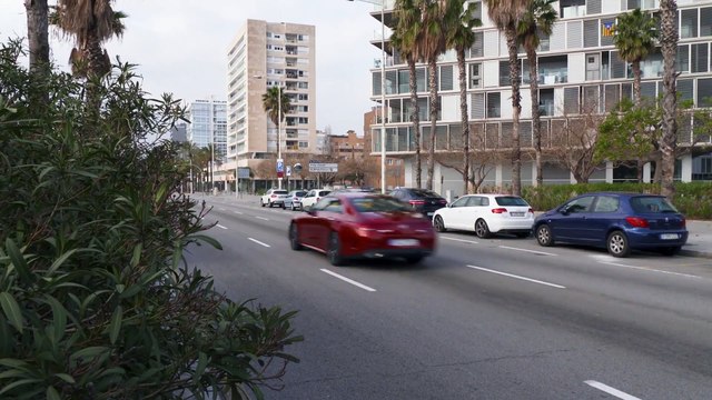 Mercedes-Benz CLS 450 4MATIC in Red metallic Driving in the city