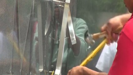 Workers remove Trump name from Panama hotel in property dispute