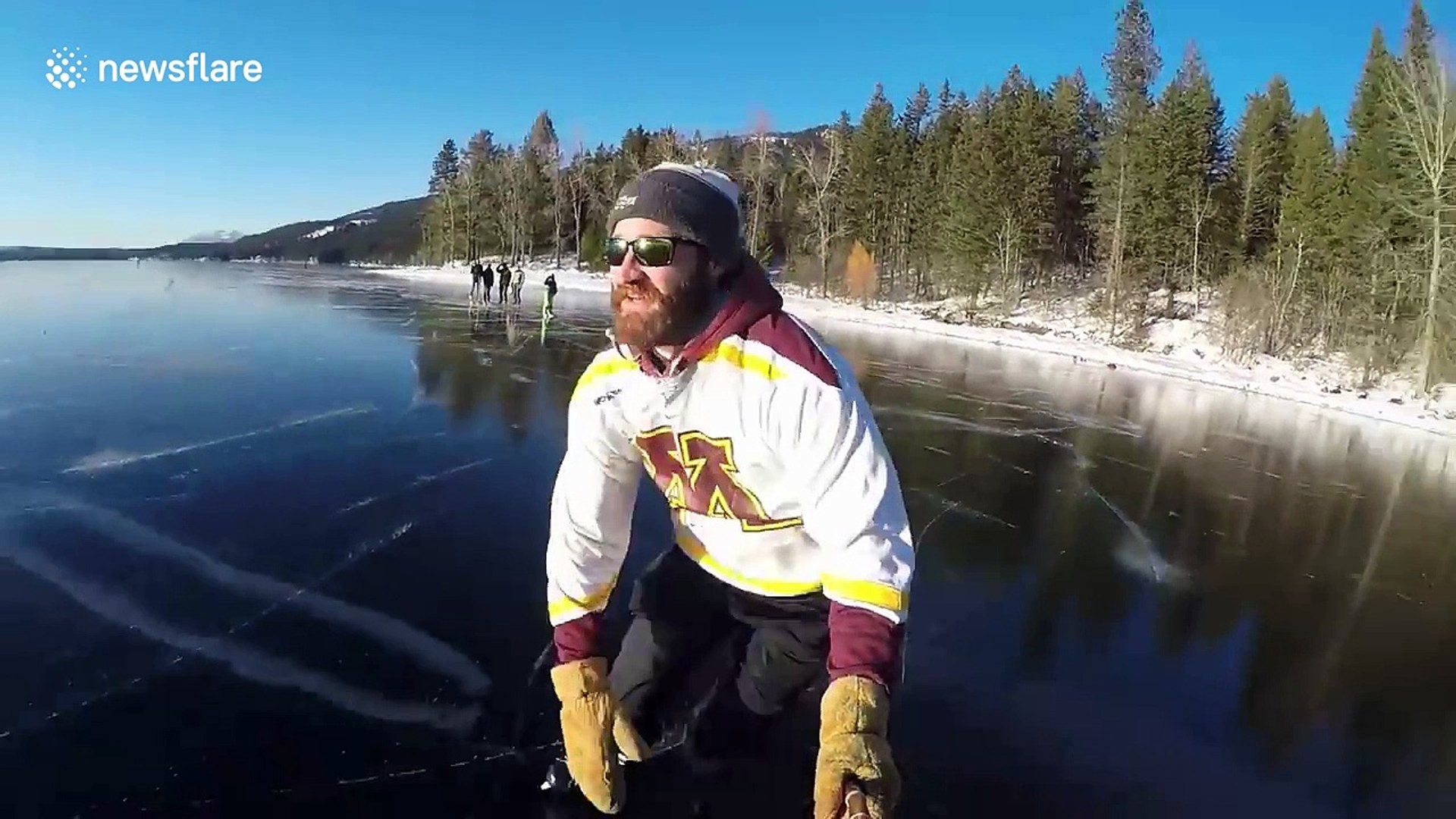 Skating on crystal-clear ice in Montana