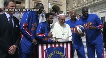 The Harlem Globetrotters teach Pope Francis how to spin a basketball on his fingers