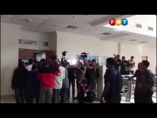 52 youths, mostly students, charged over illegal assembly