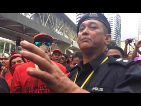 Police trying to calm down the red shirts