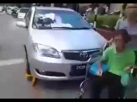 Council workers scolded for clamping disabled woman's car-2