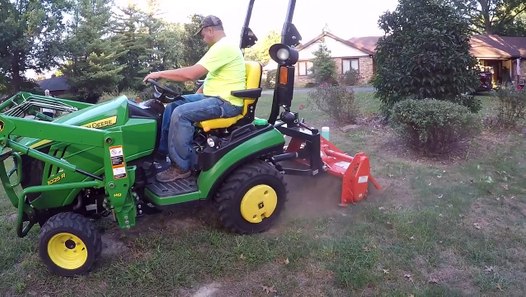 Yard Leveling. Compact Tractor Tiller and Soil Pulverizer cleanup after