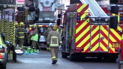 Fire service arrives at Blackpool Tower after fire traps 12