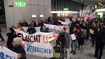 Activists March Against Deportation of Afghan Refugees