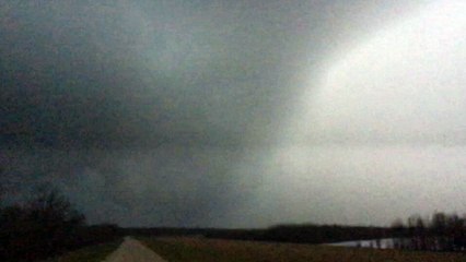 Funnel Cloud and Extremely Close Lightning Strike
