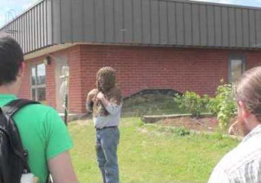 Man Casually Gives Honey Bee Lecture While Covered in Lots of Bees