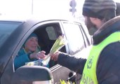 Russian Police Pull Over Female Drivers to Give Them Flowers Ahead of International Women's Day