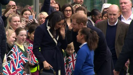 Little girl gets a big hug from Meghan Markle in Birmingham