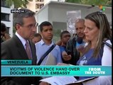 Venezuelan victims of violence hand over document to US Embassy