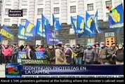 Ukraine Prime Minister warns opposition to halt protests