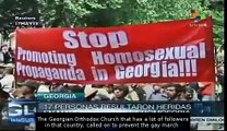 Tens of thousands protest in Georgia over gay rights rally